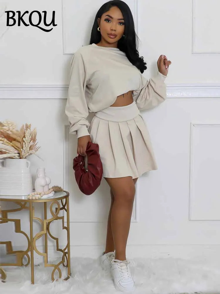 BKQU Casual Pleated Skirt 2 Piece Set Women Solid Color Long Sleeve Sweatershirt High Waist Mini Skirt Matching Tracksuit Outfit