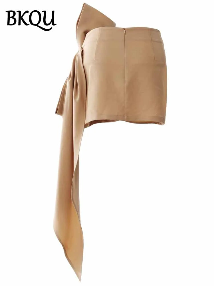 BKQU Asymmetric Pleated Bow Elegant Mini Skirt Women 2025 Spring Summer Fashion High Waist Slim Wrap Hip Short Skirt Party Wear