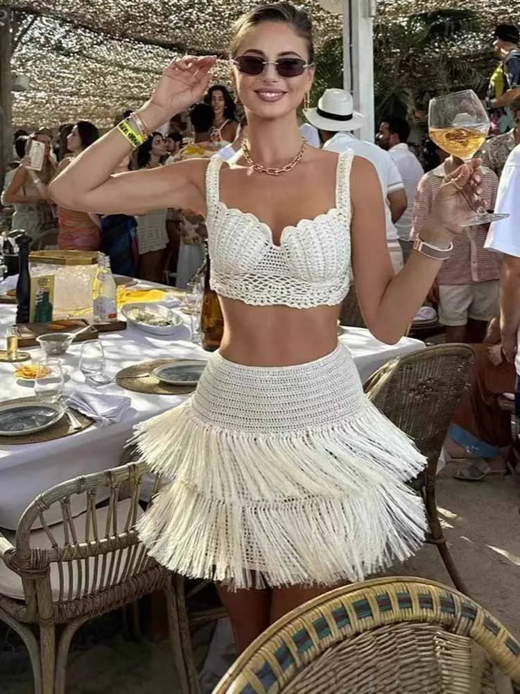 BKQU Summer Knit Two Pieces Set Women Sexy Hollow Out Bikini Crop Top High Waist Tassel Mini Skirt 2025 Lady Beach Party Outfits