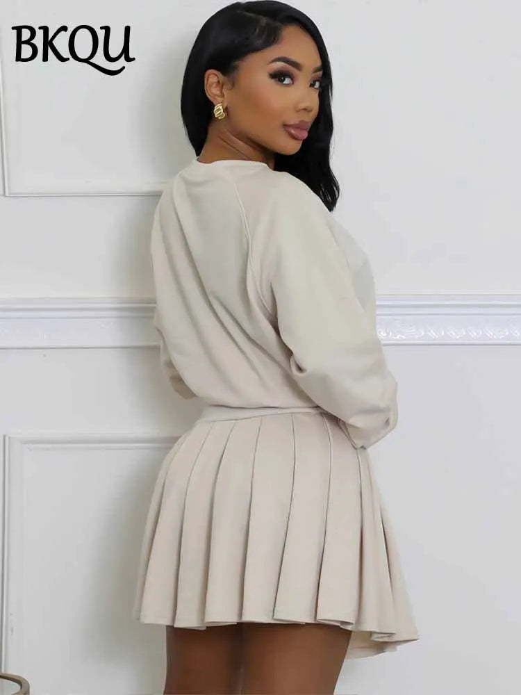 BKQU Casual Pleated Skirt 2 Piece Set Women Solid Color Long Sleeve Sweatershirt High Waist Mini Skirt Matching Tracksuit Outfit