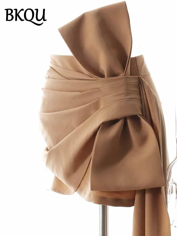 BKQU Asymmetric Pleated Bow Elegant Mini Skirt Women 2025 Spring Summer Fashion High Waist Slim Wrap Hip Short Skirt Party Wear