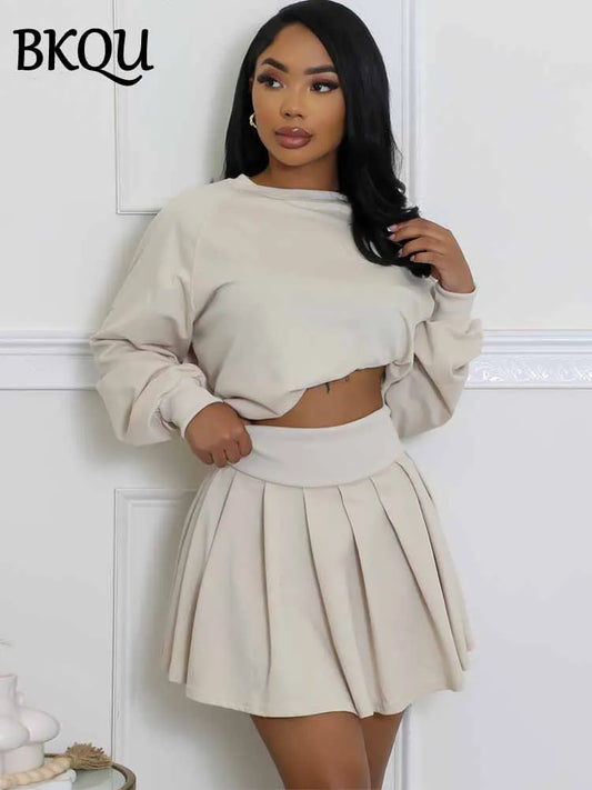 BKQU Casual Pleated Skirt 2 Piece Set Women Solid Color Long Sleeve Sweatershirt High Waist Mini Skirt Matching Tracksuit Outfit